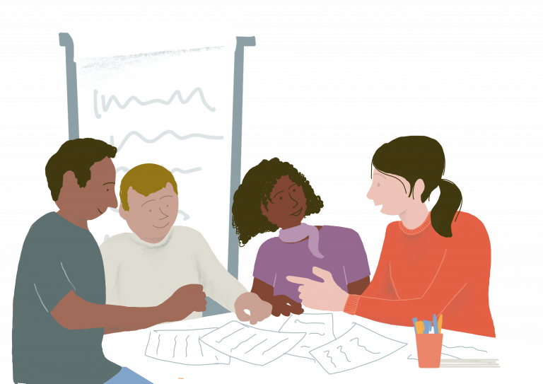 Four people talking around a table.